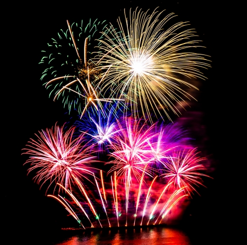 Beautiful fireworks display on black sky - Beautiful color fireworks display on black sky at night for celebration - siraphol siricharattakul